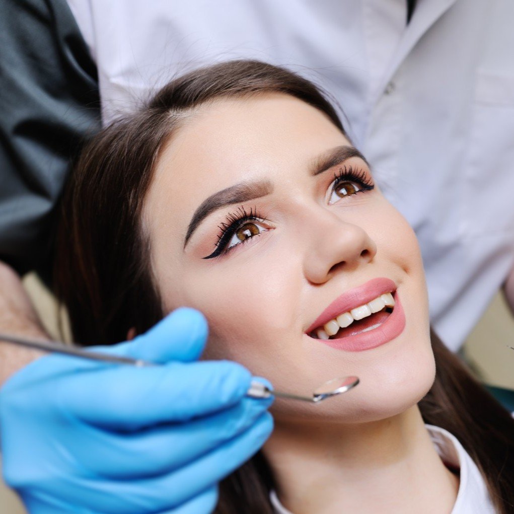 dental extractions - tooth removal - White Township Dentist Examining Patient Hackettstown NJ